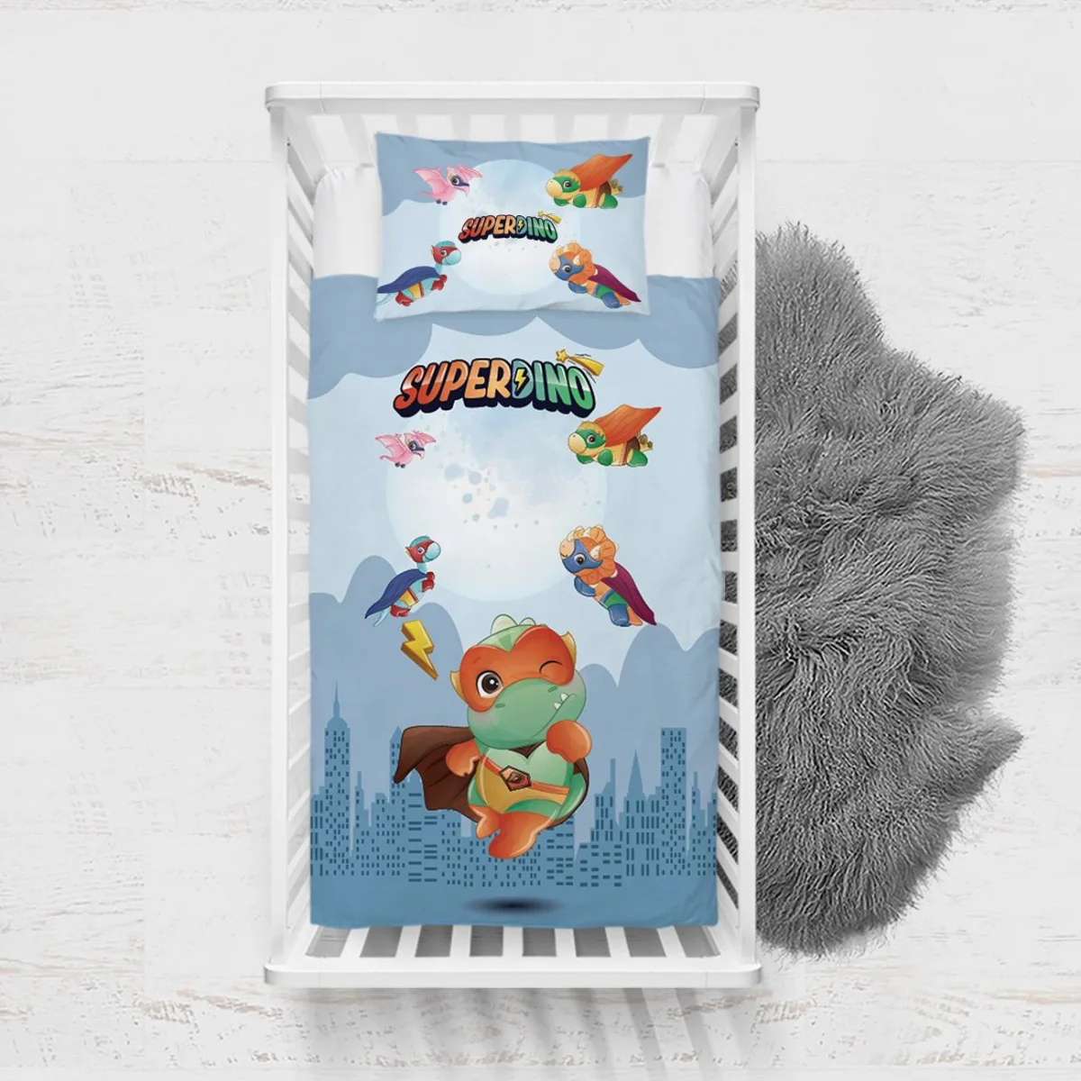 Süper Kahraman Dinozorlar Yatak Örtüsü ve Pike | Mavi şehir silüetleri, ay Desenli