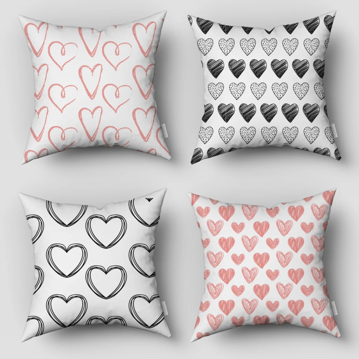 Kalp 4lü Kırlent | Beyaz Farklı çizim tarzlarında pembe ve siyah kalpler Desenli
